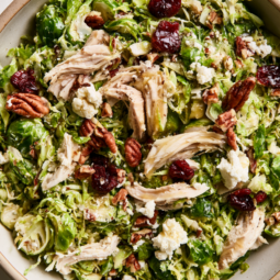 Brussels Sprout Salad with Cranberries, Pecans, & Maple-Dijon Vinaigrette-bowl