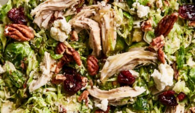 Brussels Sprout Salad with Cranberries, Pecans, & Maple-Dijon Vinaigrette-bowl