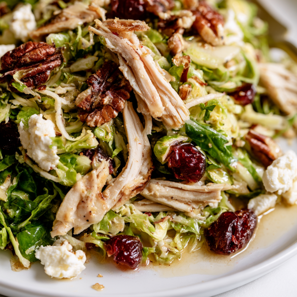 Brussels Sprout Salad with Cranberries, Pecans, & Maple-Dijon Vinaigrette-closeup
