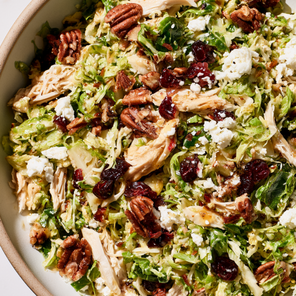 Brussels Sprout Salad with Cranberries, Pecans, & Maple-Dijon Vinaigrette
