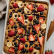 High-Protein Sheet Pan Pancakes with berries