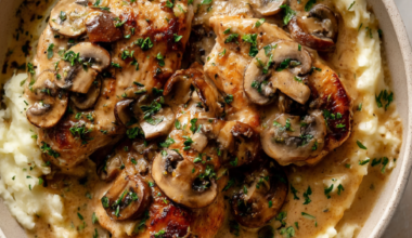 Cream of Mushroom Chicken Crockpot Recipe - over mashed potatoes