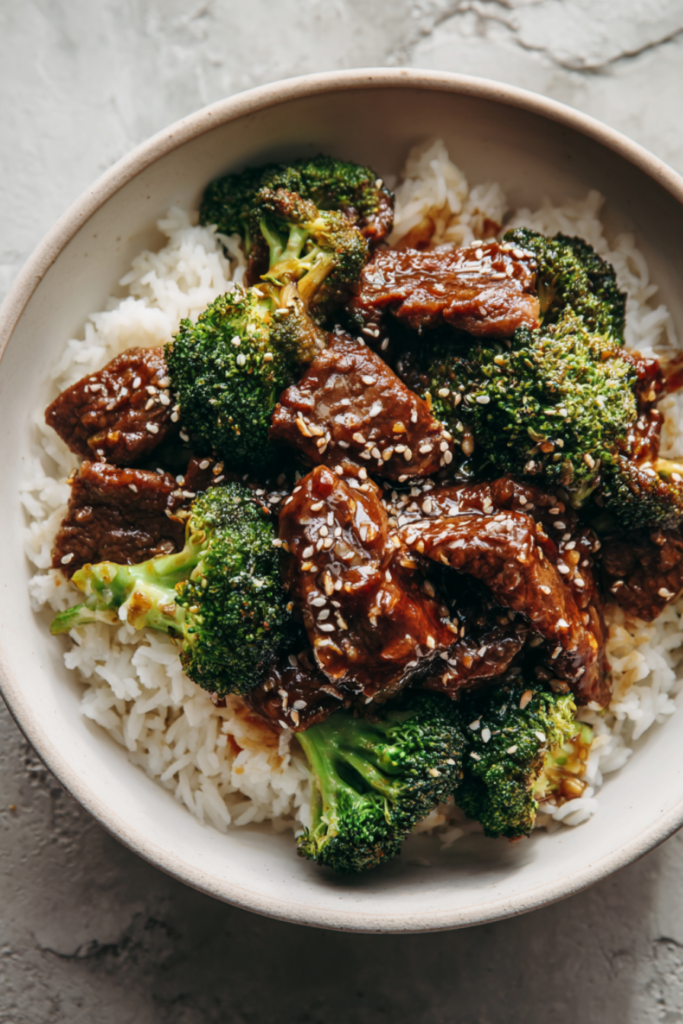 Honey Garlic Steak Bites Crockpot Recipe-over rice