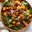 Roasted Pumpkin Quinoa Salad with Feta & Pomegranate-bowl