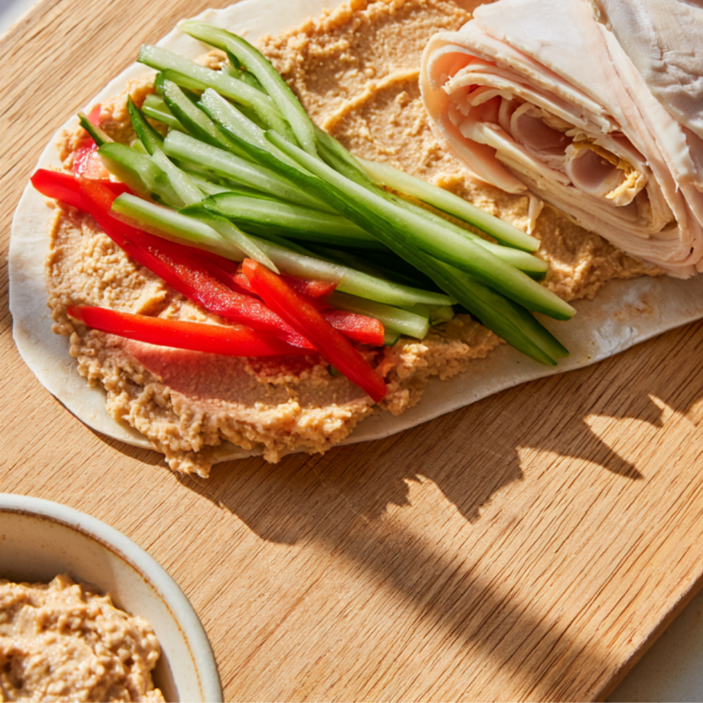 Turkey Pinwheels Meal Prep Box Recipe-rolling up